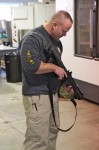 Playing with the new Keltec KSG shotgun. It was a cool gun. It would be a lot cooler if it functioned reliably.