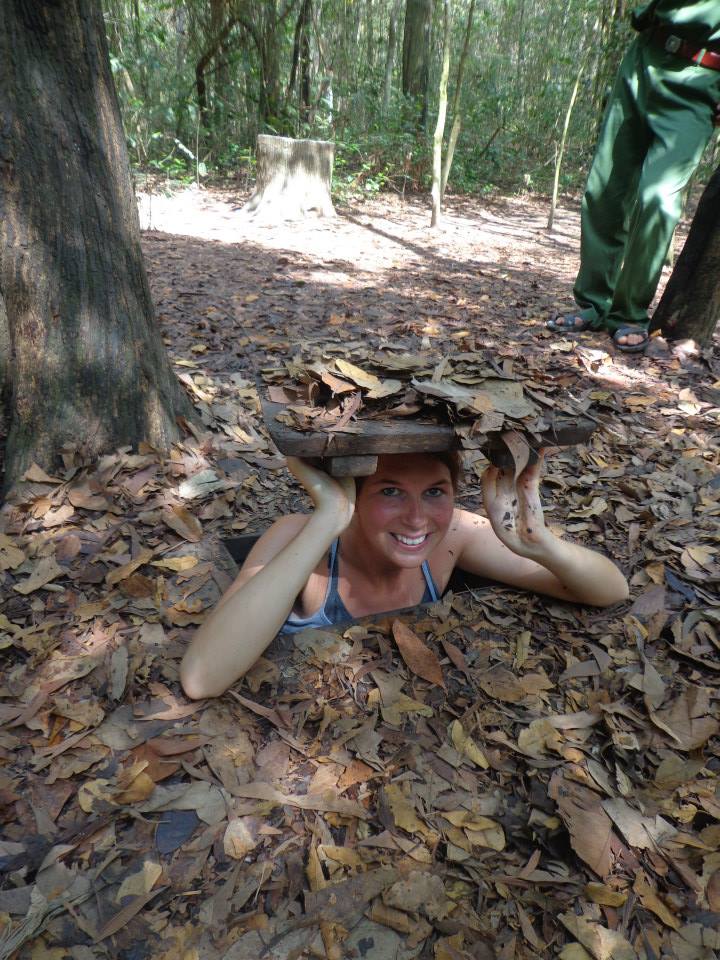 One of my friends popping up from a camoflaged tunnel opening in the jungle. It's easy to see how difficult it was for us to locate the hidden tunnels