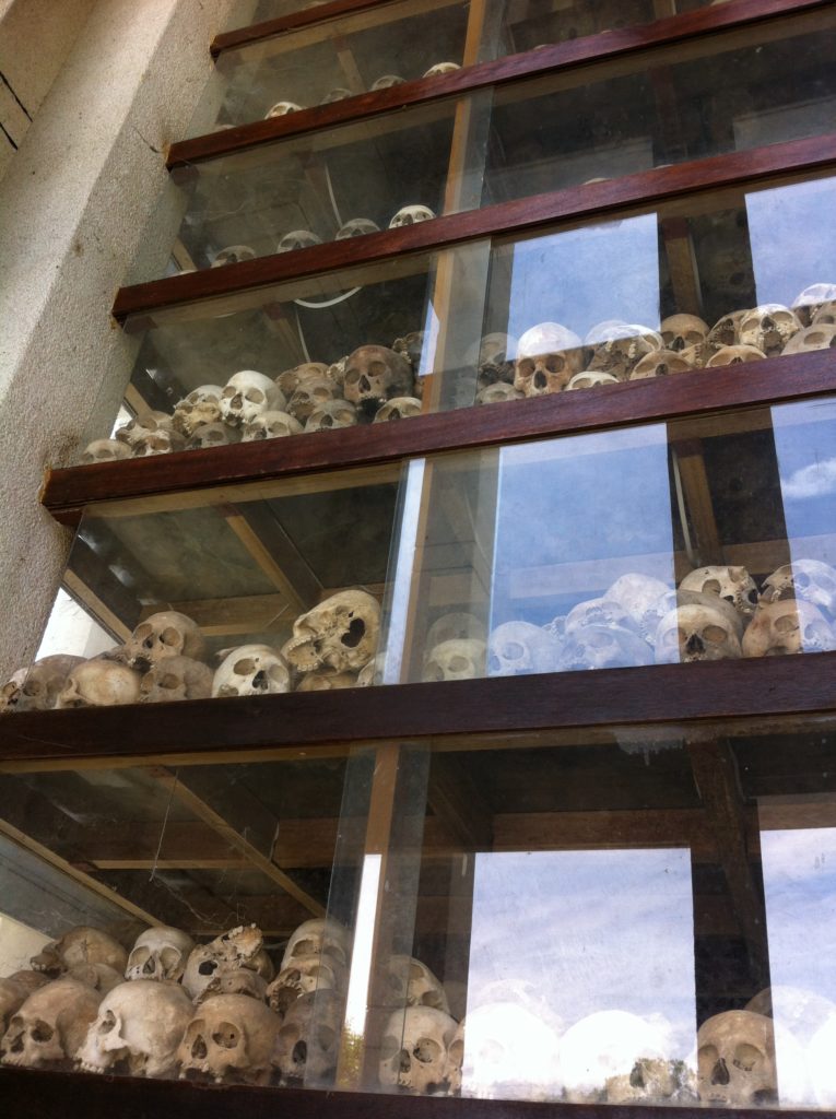 Genocide monument filled with skulls excavated from the graves of the killing fields.