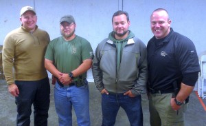 L-R Greg Peters of Peters Custom Holsters Wayne Fisher and Rob Tackett of Practical Firearms Training Me