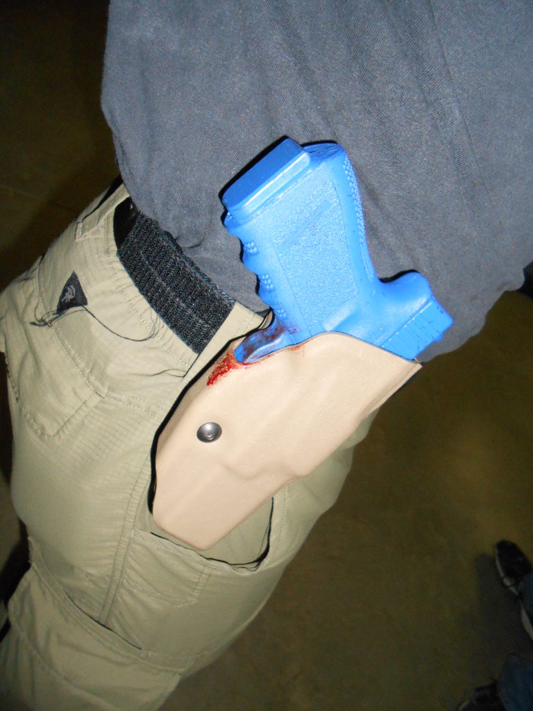 Author's Safariland ALS retained the gun during an intense struggle in a training class. The "bad guy's" blood on the holster demonstrates the struggle's intensity