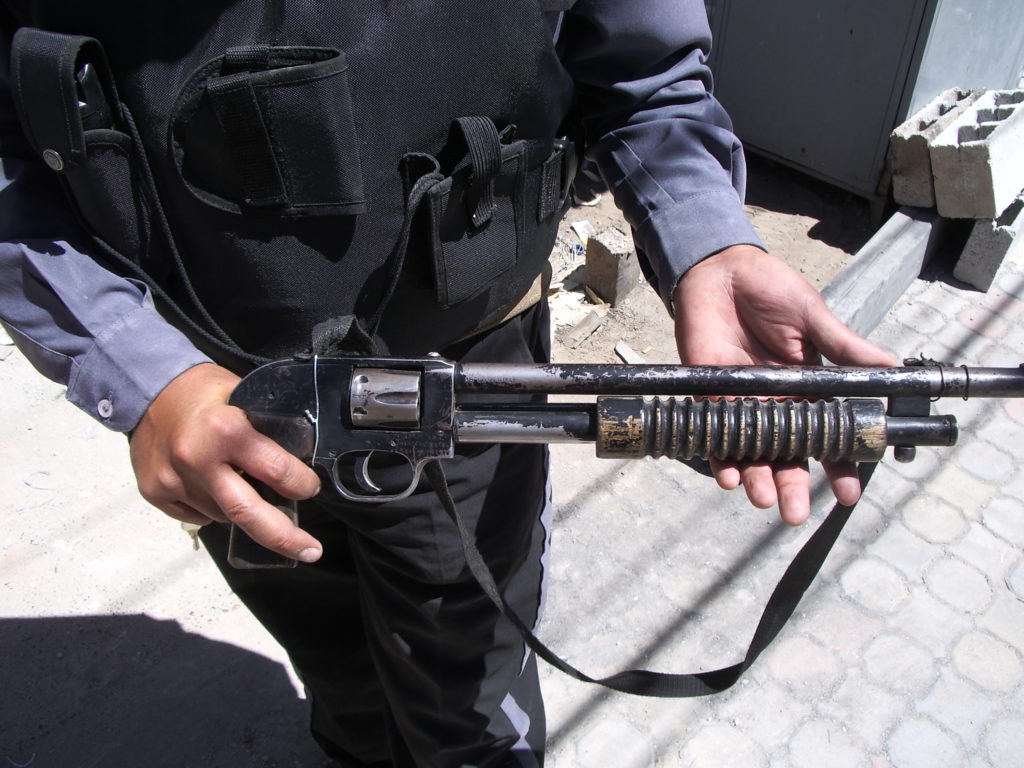 One of the more interesting guns I saw on my last trip to Ecuador. It was being carried by a security guard and was chambered in .38 S&W. It's a revolver with a long barrel designed to look like a pump shotgun.