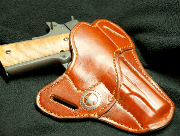 "Pancake" style belt holster with slots for belt