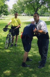 Teaching weapon retention skills to exhausted police bike officers. It's hard to fight when you start out tired!
