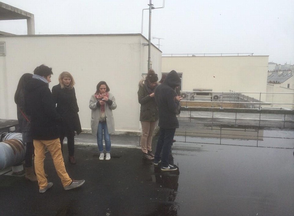 Photo of evacuees stranded on the office roof