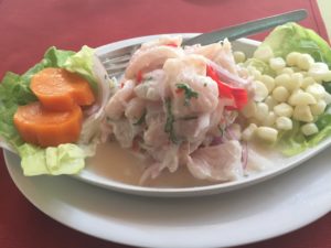 Amazing fish ceviche lunch at a sidewalk cafe in Lima