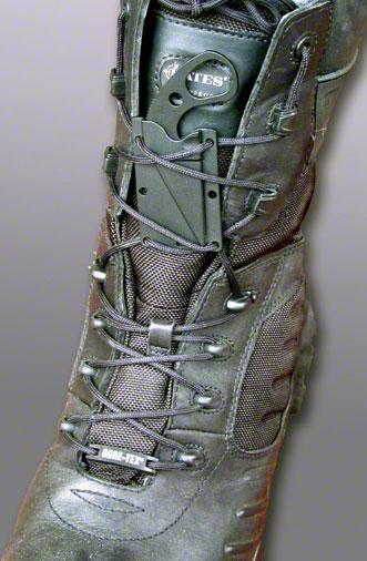 LDK knife laced into boot. The hole in the handle allows a one-finger draw when it is laced flat like this and a proper grip can't be obtained.
