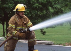 17470-a-firefighter-with-a-water-hose-pv