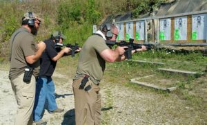 Bryan and I duking it out for first place in one of the shooting competitions