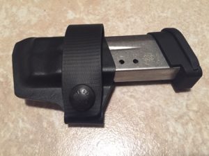 Plan B installed on my S&W Shield magazine.  Horizontal magazine carrier from Andrew Bawidamann. http://bawidamann.com/magazine-carriers/horizontal-uber-cc-mag-carriers/